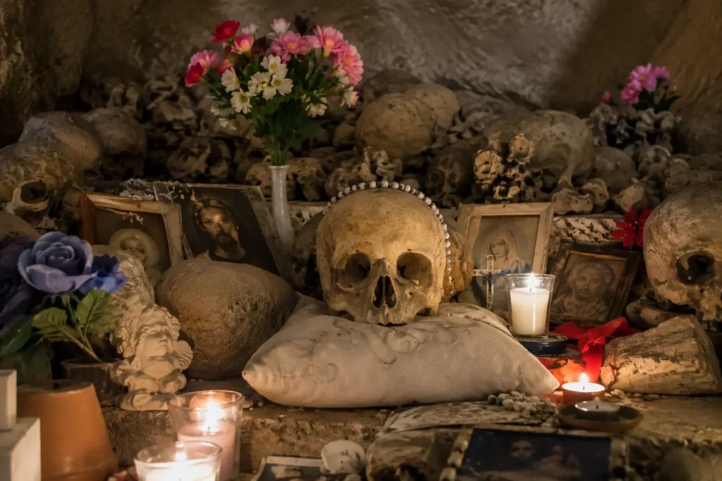 Traditional anime pezzentelle devotional altar inside Fontanelle Cemetery Naples