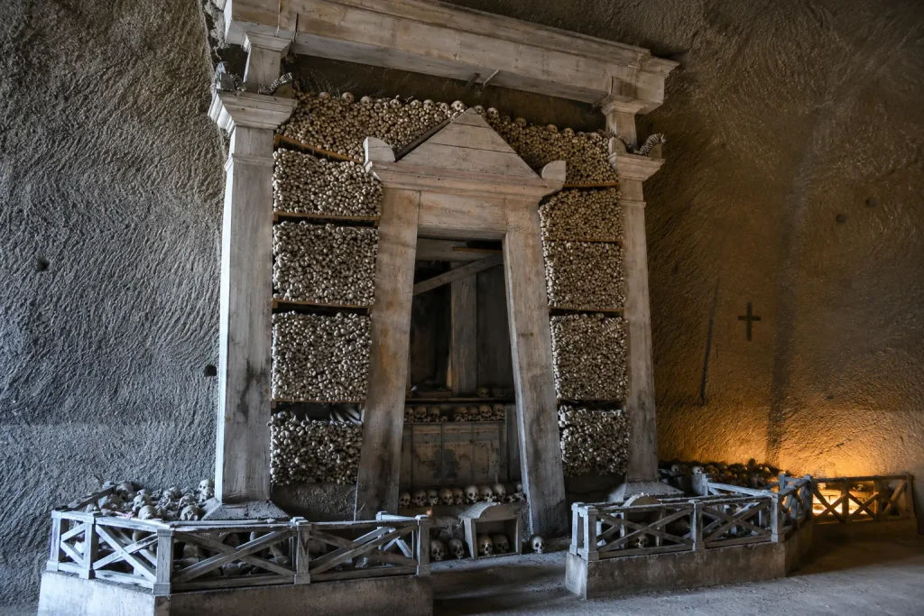 Historic bone wall and ossuary structure inside Fontanelle Cemetery Naples