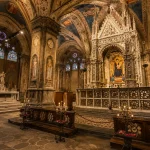 Orcagna Tabernacle inside Orsanmichele Church in Florence with Gothic arches and stained glass