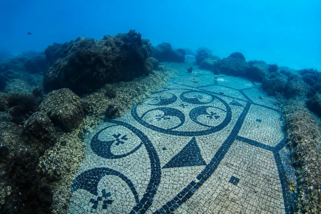 Ancient Roman mosaic preserved beneath the waters of La Gaiola Underwater Park in Naples, Italy